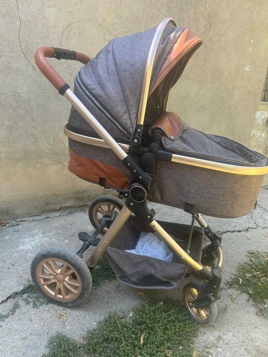Детская коляска с амортами