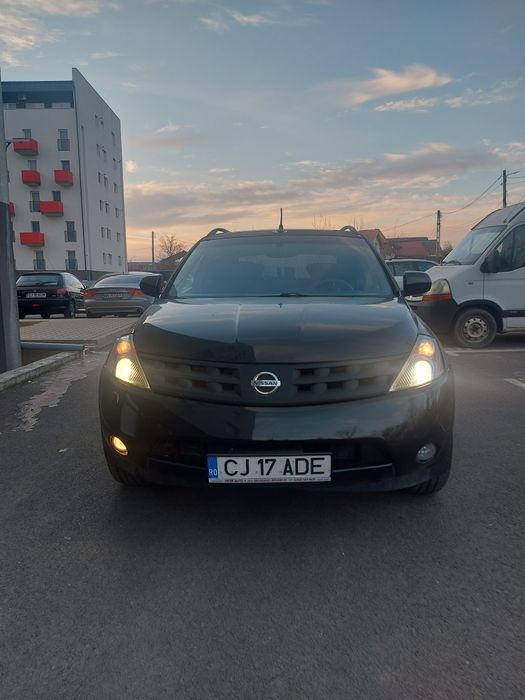 Schimb nissan murano cu scuter electric model soco