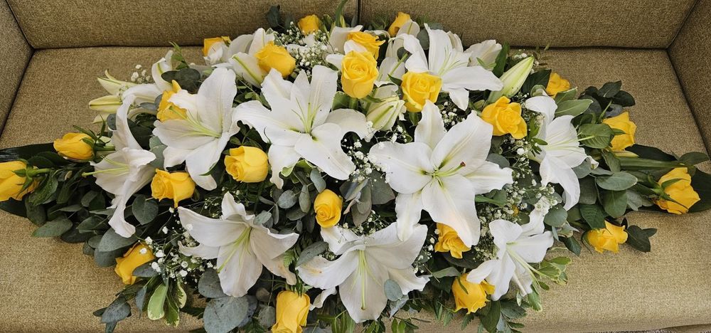 Доставка на цветя, венци и траурни стоки