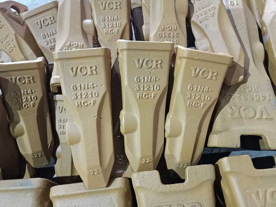 Коронки зубья экскаватора