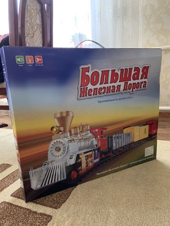 игрушка поезд и рельсы вагоны