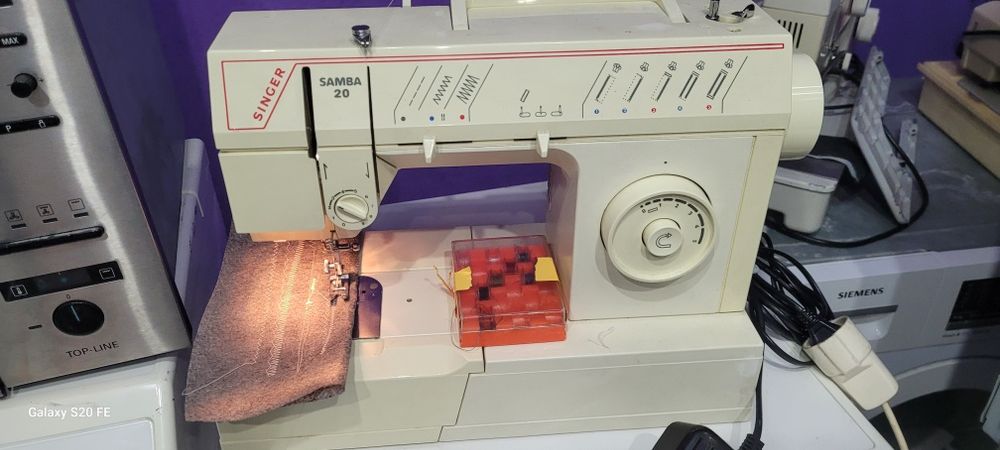 Mașina de cusut Singer