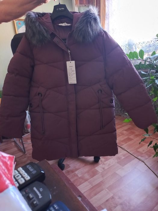Продам новый зимний женский пуховик.