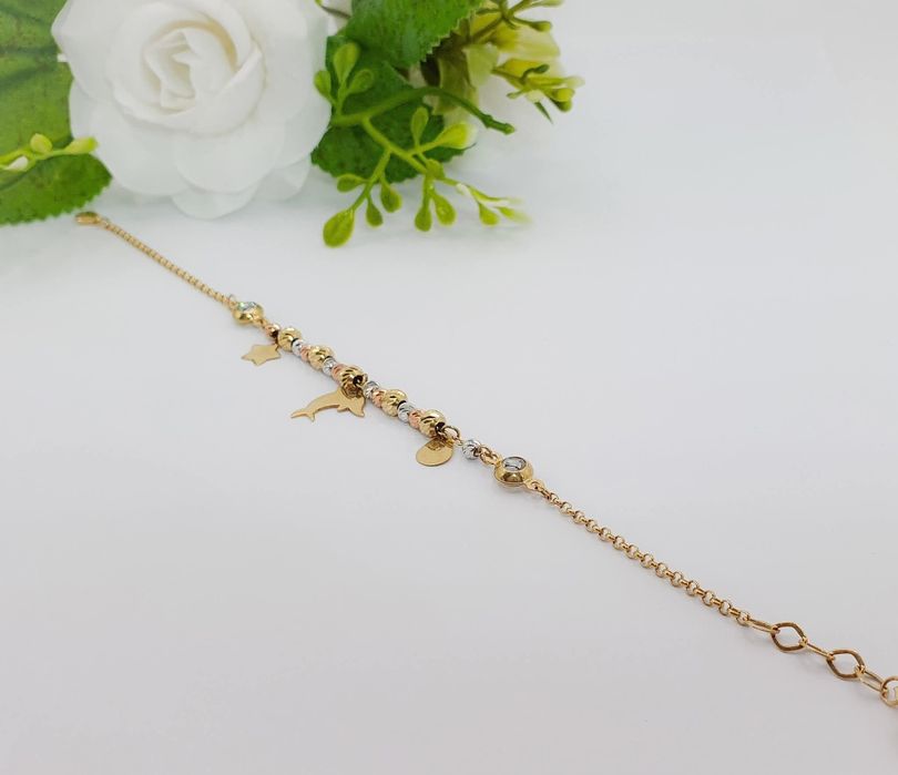 Brățară din aur 14K cu bile bicolore și accesorii delfin etc ...
