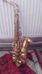 Saxofon Selmer seria ll .Scrie pe el ce denumire are . Preț neg