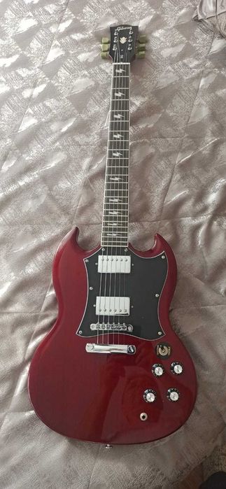 Электрогитара Gibson SG — новая