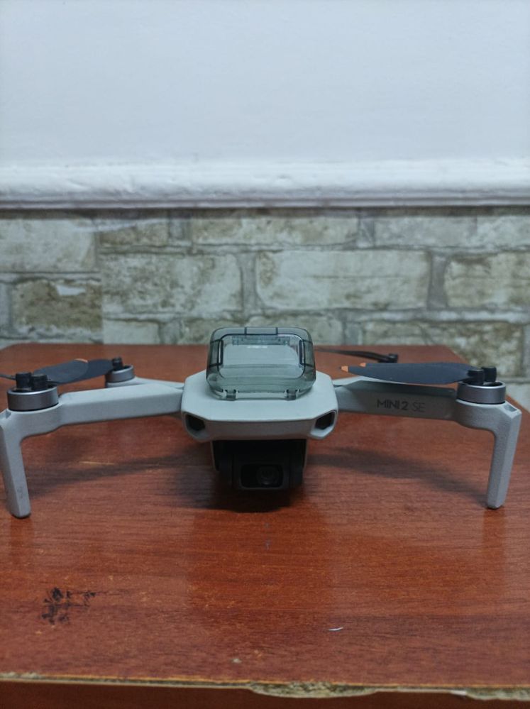 Дрон DJI Mini 2 SE Fly More Combo серый