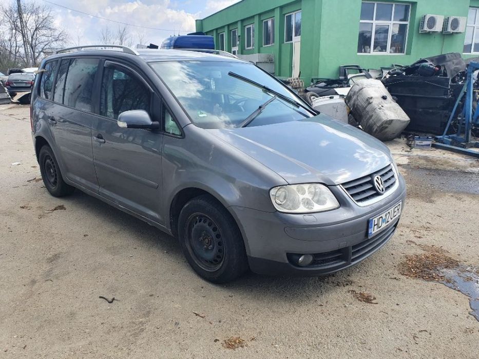 usa portiera stanga dreapta aripa fuzeta etrier planetara brat VW Touran motor 2.0tdi dezmembrez