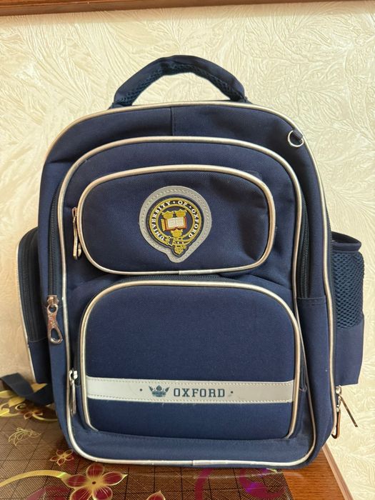 Рюкзак синий, сумка черная