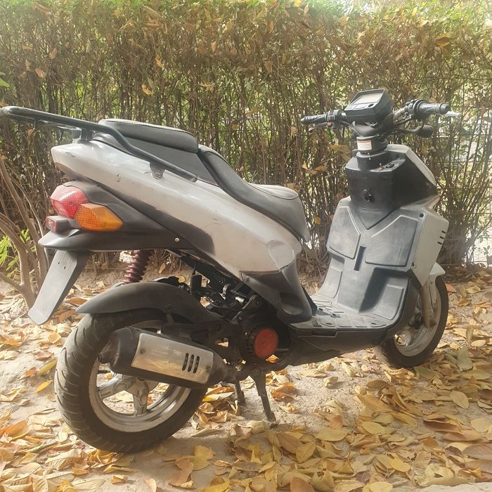 Скутер Daelim A Four