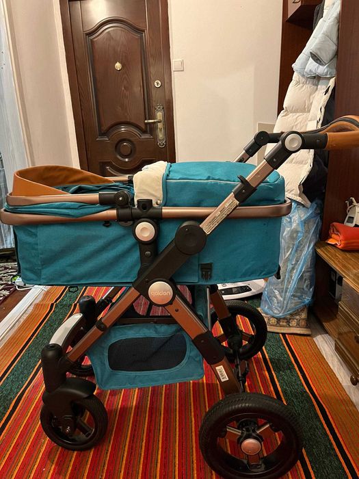 Детская коляска фирмы GOLDEN