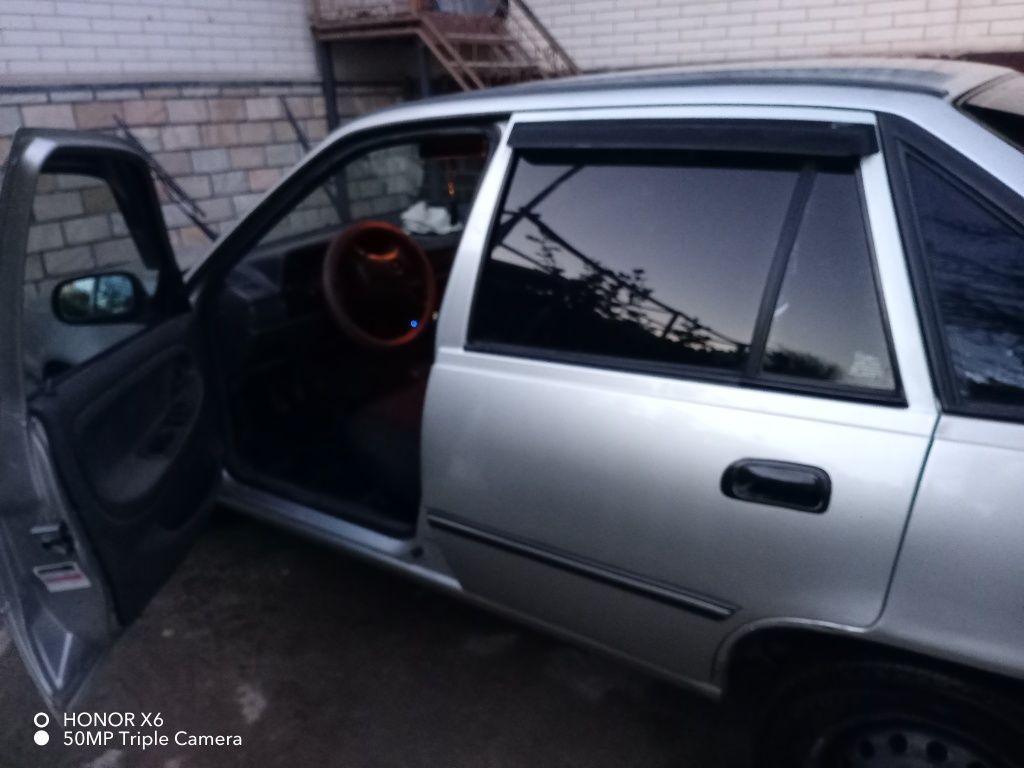 2004 yil 235 min yurgan halol moshina xolati  tiniq minishga tayor