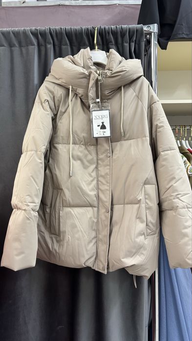Куртки новые