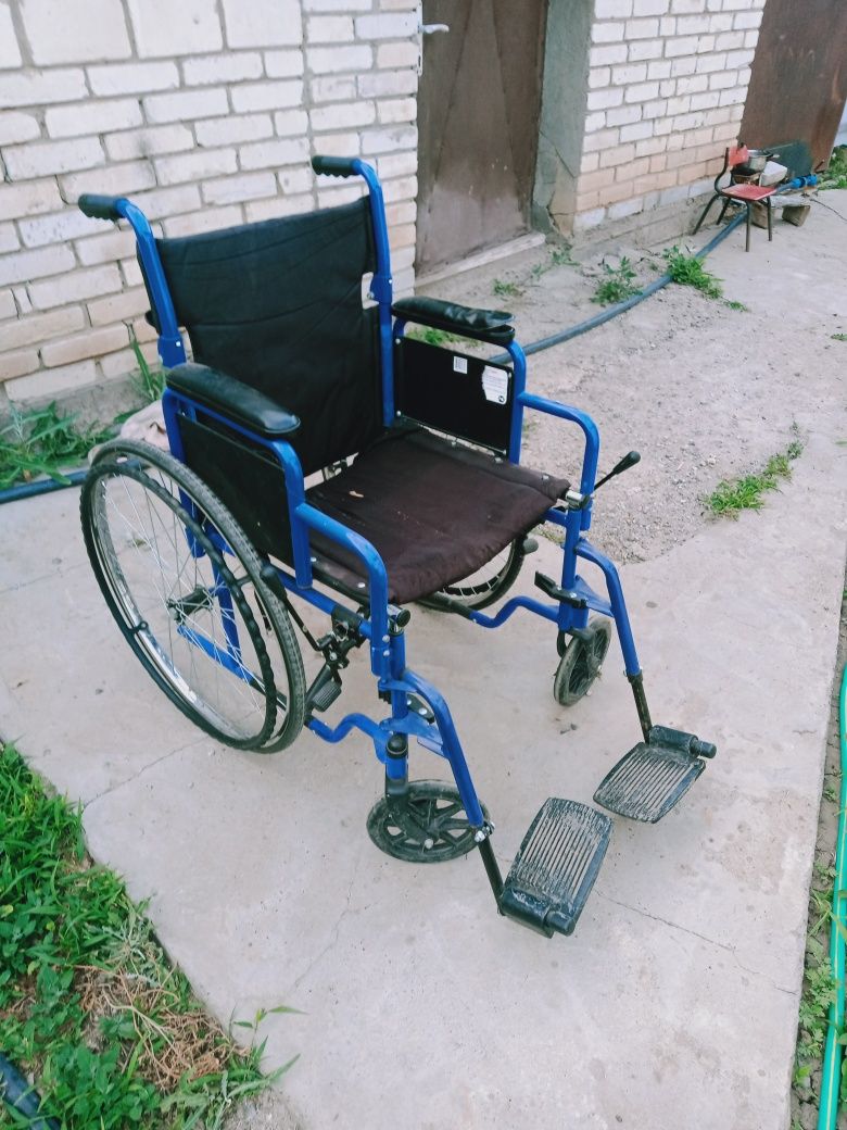 Инвалидная коляска на ходу