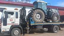 Auto platforma Volvo Fl6 intercooler  cu troliu, macara și furcă