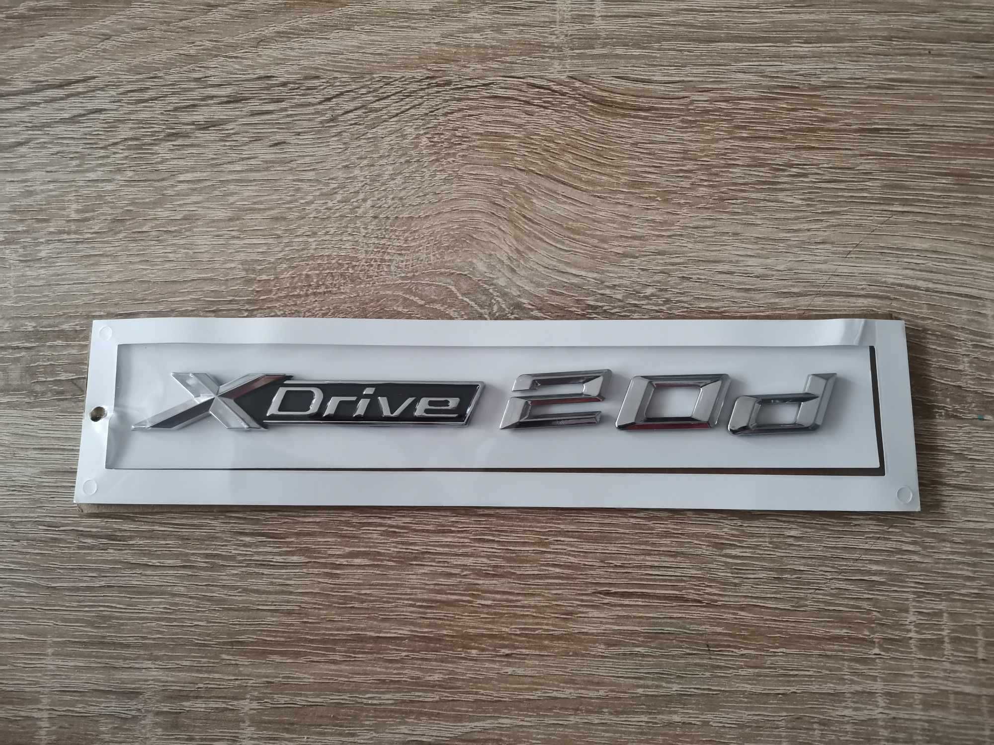 сребрист надпис BMW Xdrive 20d