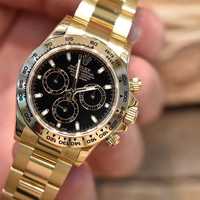 Часовници Rolex Daytona златно/черно