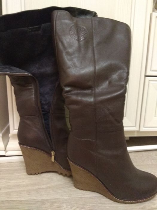 Продам новые сапоги