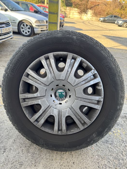 Vand 4 roti de iarna r15 ,5x112 cu capace