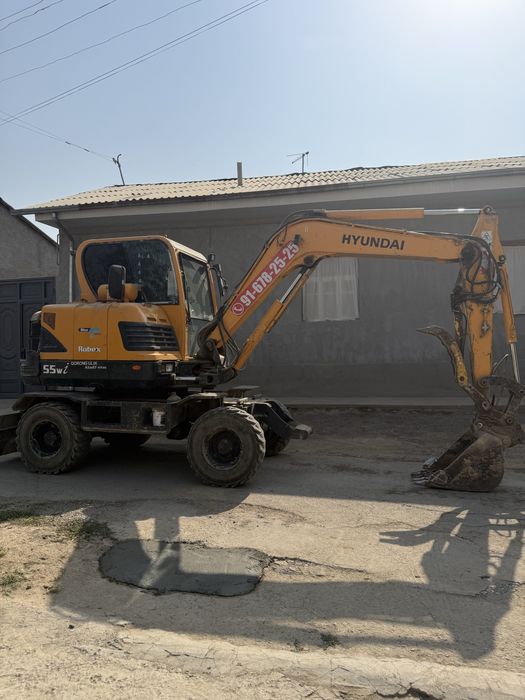 Ekskavator xizmati katta va kichik