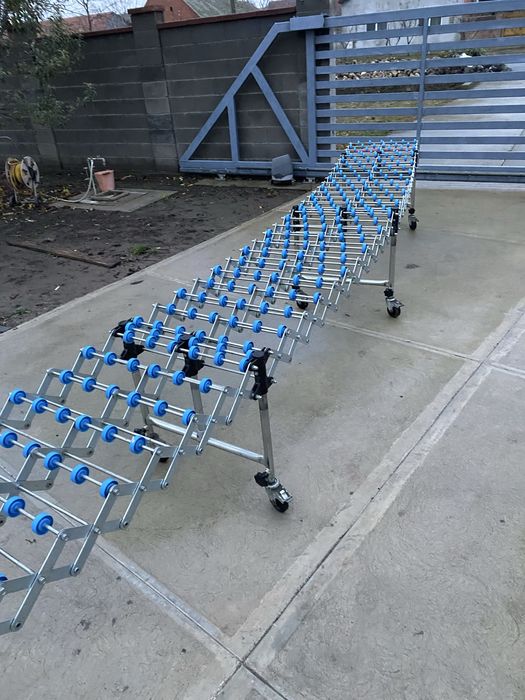 Banda transportoare , cale cu role mici flexibila Gura