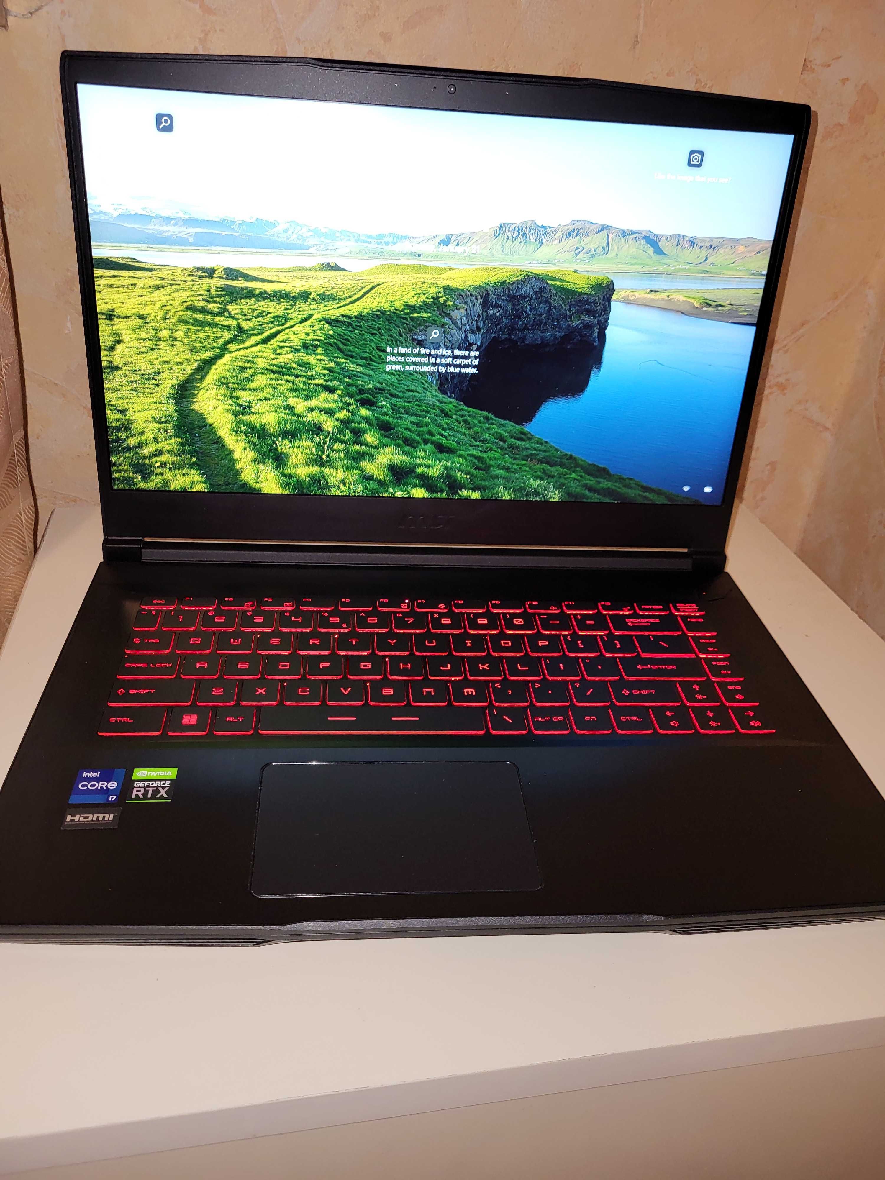 Laptop gaming msi "GF63 Thin 11UD" căști gaming si mouse.