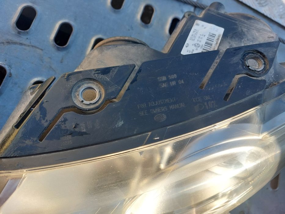 Far faruri halogen h7 vw Passat b6 berlina break Hella Europa