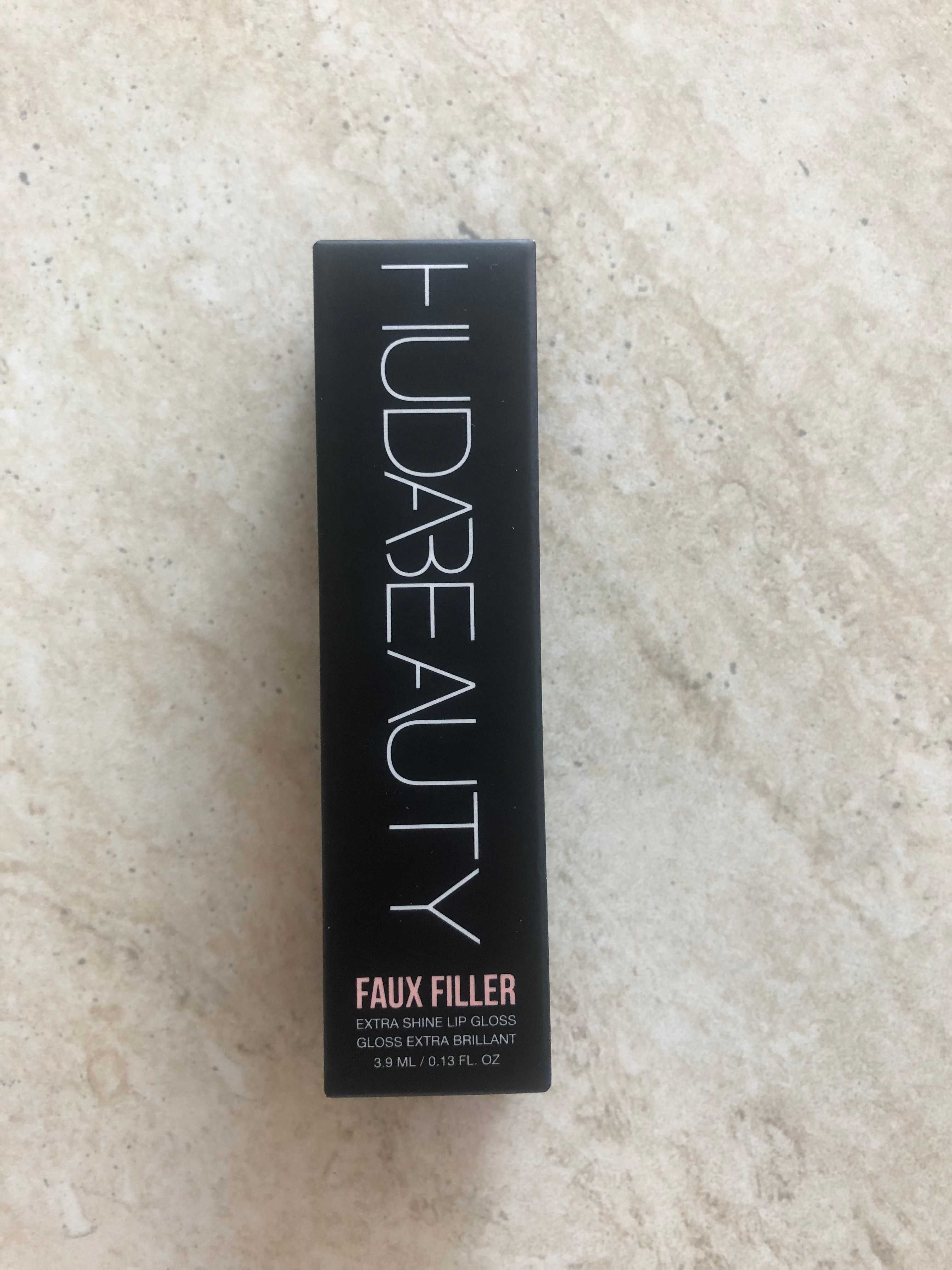 Нов гланц Huda Beauty Faux Filler Extra Shine Lip Gloss