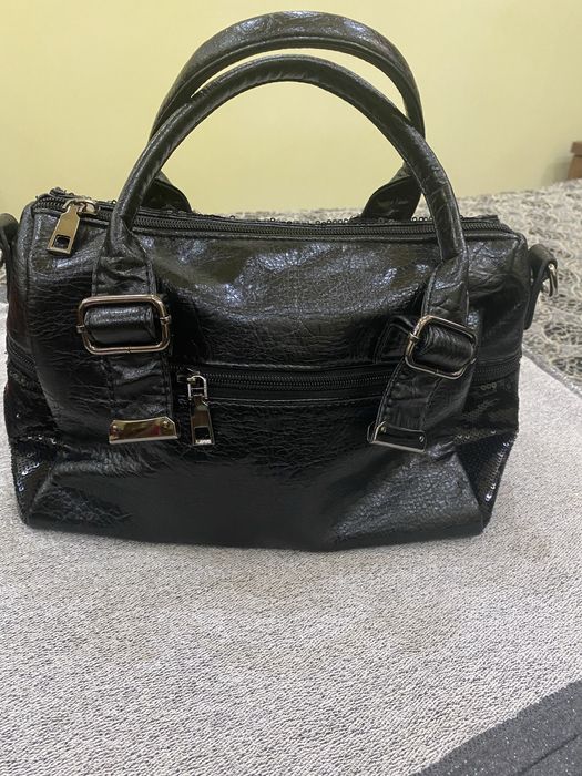 Аеллар сумкаси кора рангда холати яхши