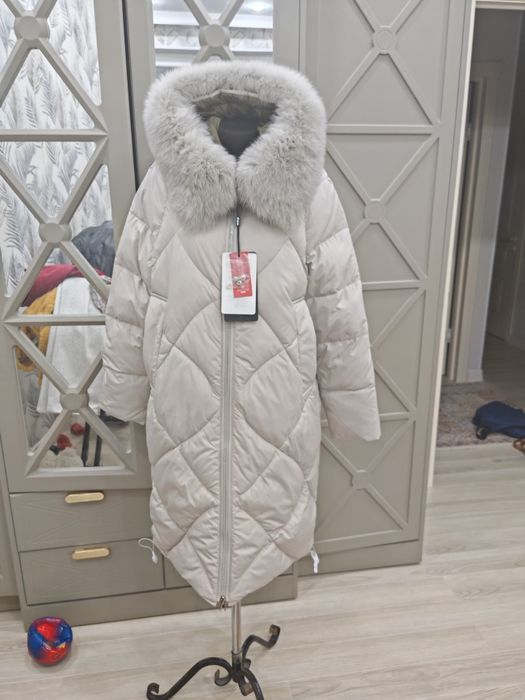 Продам Пуховик новая
