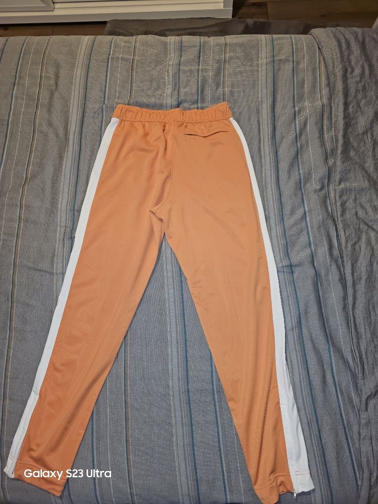 Pantaloni Nike portocalii