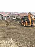 Buldoexcavator picon cilindru compactor autobasculata