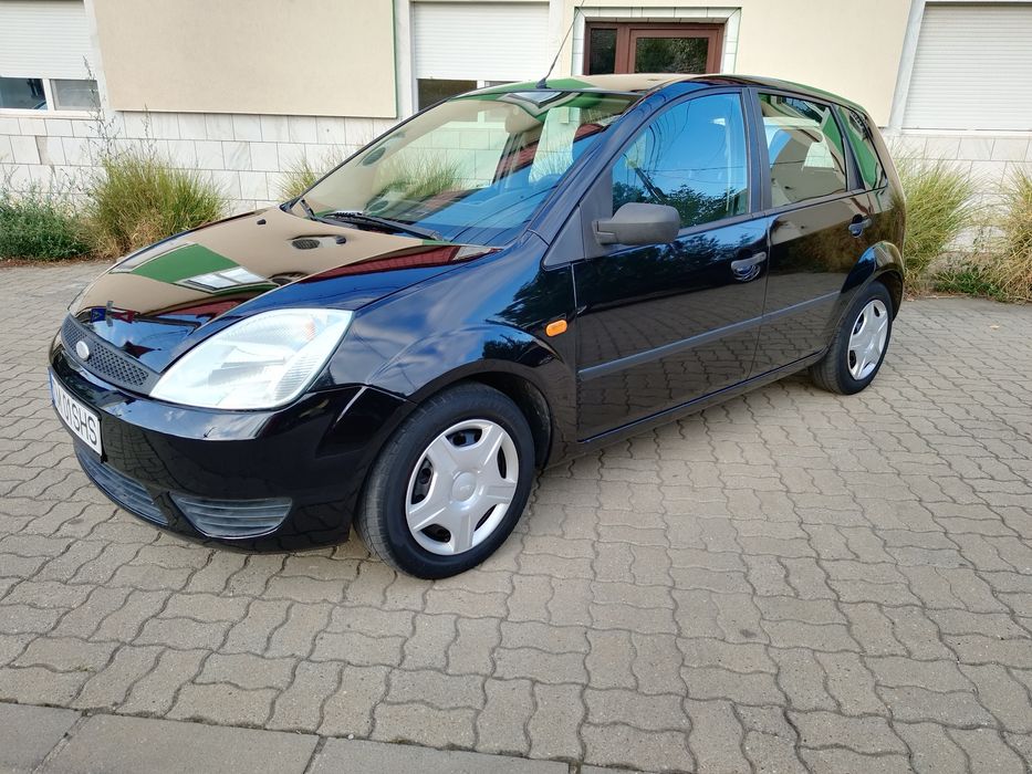 Ford Fiesta 1.3i cu 68 cp, an 2004, euro 4, AC, central