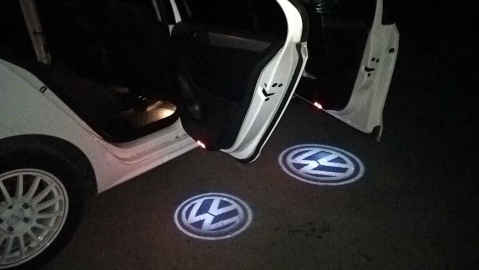 проекция логотипа Фольксваген