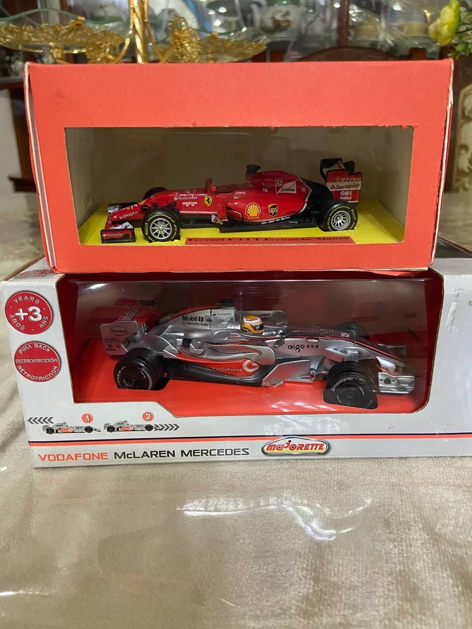 коллекционные игрушечные  машина burago Mersedes McLaren Ferrari f1