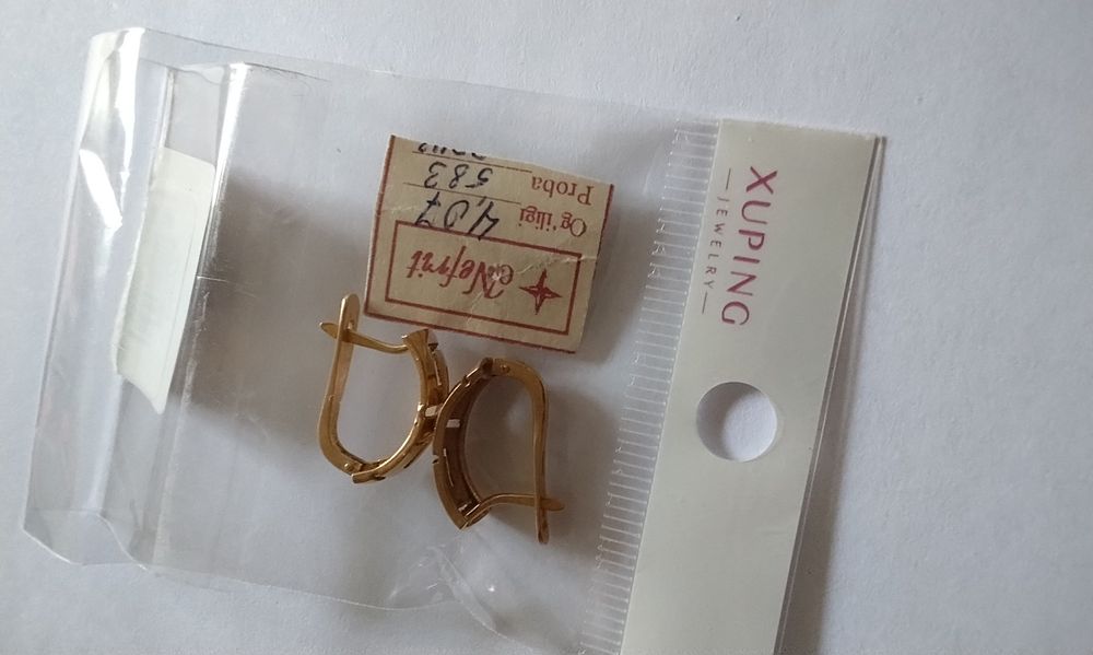 Продаю серьги золотые "Нефертити"