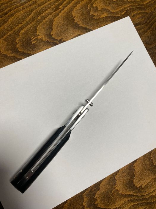 Сгъваем нож с текстилен калъф.