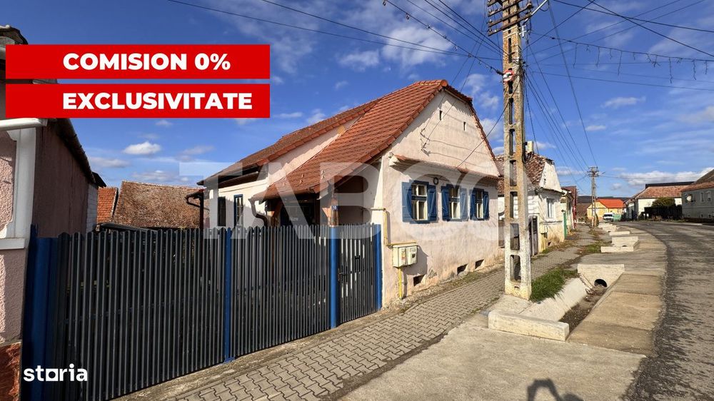 Casa de vanzare cu curte spatioasa loc relaxare si gradina Cornatel