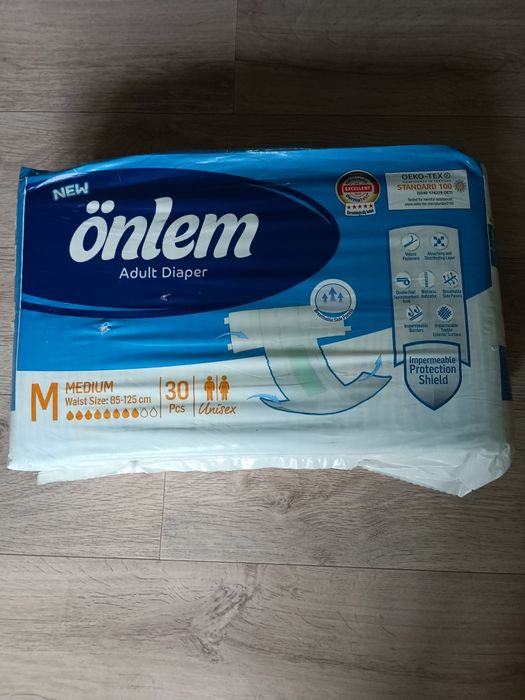 Продам подгузники и памперсы
