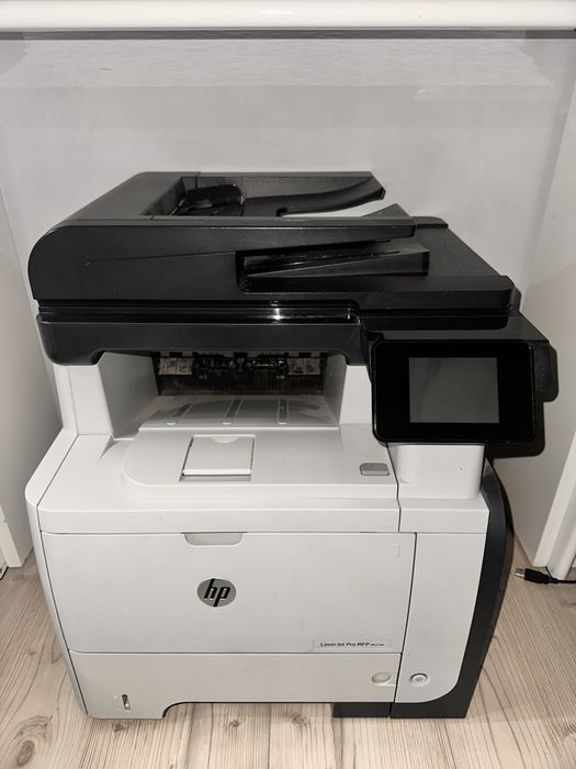 Принтер HP LaserJet Pro MFP M521dn