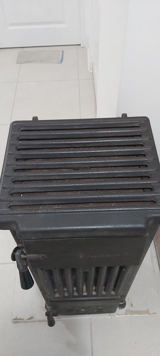 Sobă șamotată cu burlane, coturi și radiator de căldură