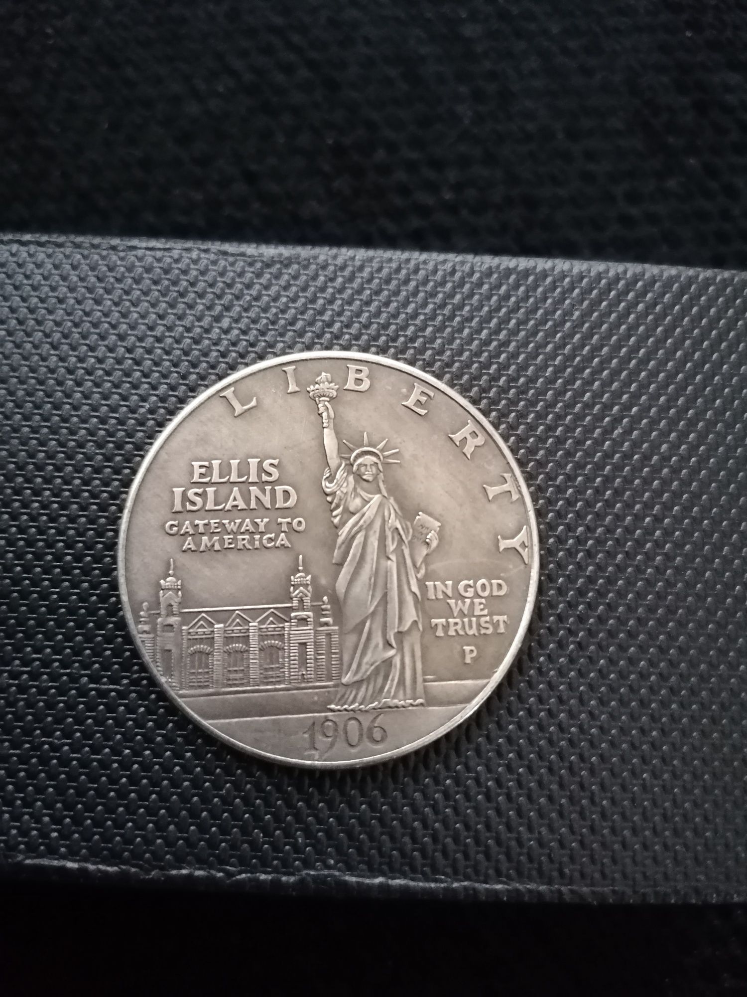 Moneda Liberty,One Dollar, Ellis Island 1906