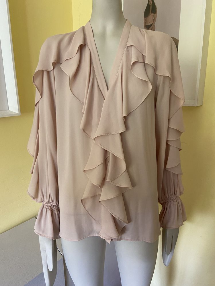 Ризи Zara, New Yorker