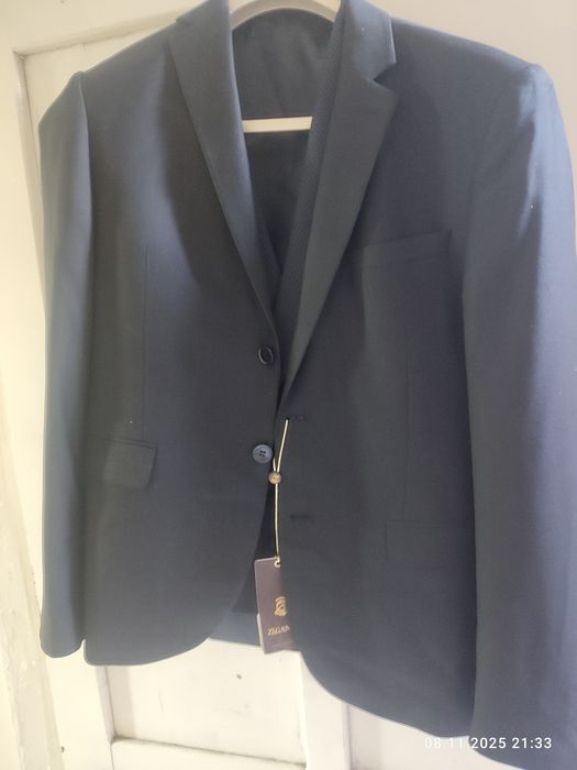 Мужские костюмы новые