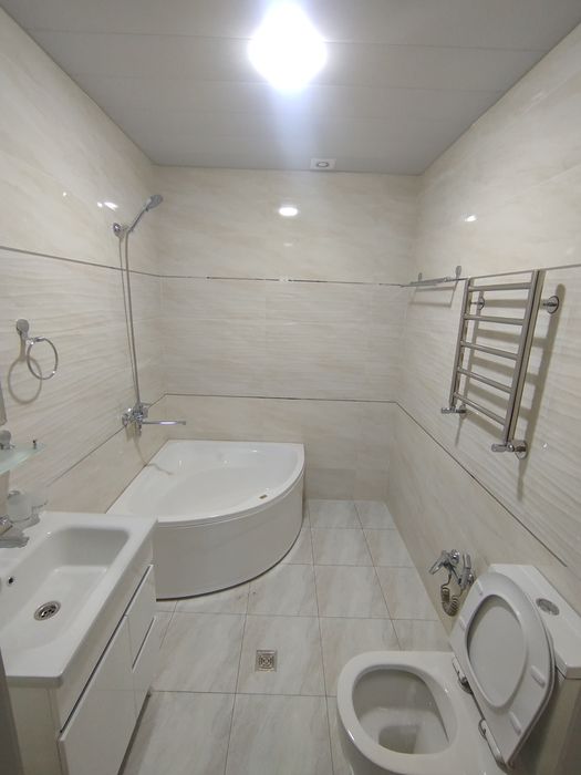 Янги курилган уй сотилади 2сотих 7хона Зангиотада