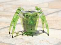 Robot jucarie tip paianjen din plastic verde transparent