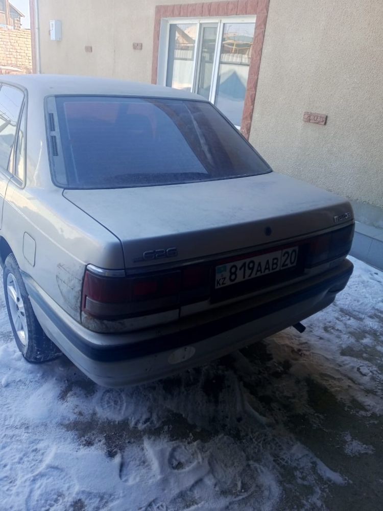 Машина Mazda 626