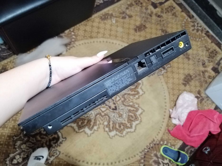 PS2 с един джойстик и 4 игри