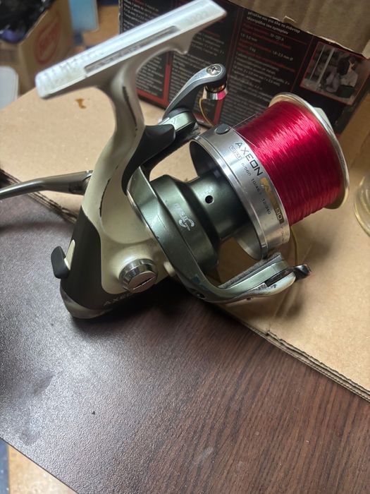 Макара Okuma axs90