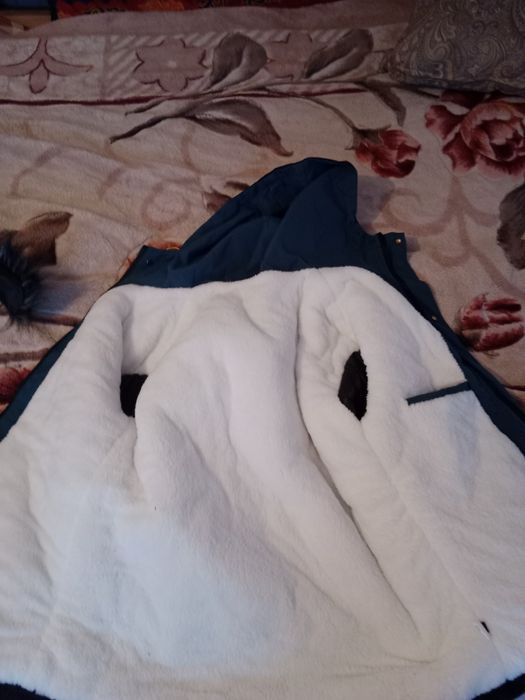 Новая куртка,не кто не носил